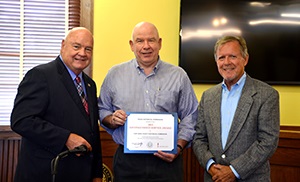 Pictured L to R:  Fort Bend County Judge Bob Hebert, and Fort Bend County Historical Commission Members/Volunteers Charles Kelly and Don Brady
