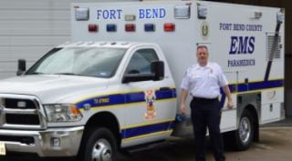 Chief Temple inspecting the new look for EMS units.