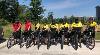 Fort Bend EMS Bike Team in yellow shirts