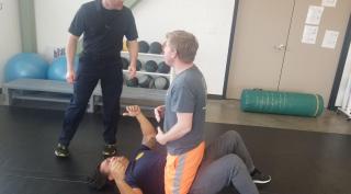 Employees training in self-defense