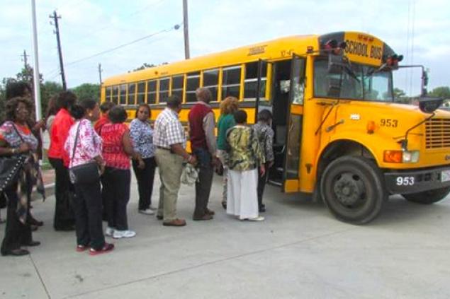 Patrons Boarding Bus to Ensemble Theatre