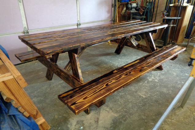 8' picnic table with attached benches with burnt finish and outdoor polylcoat